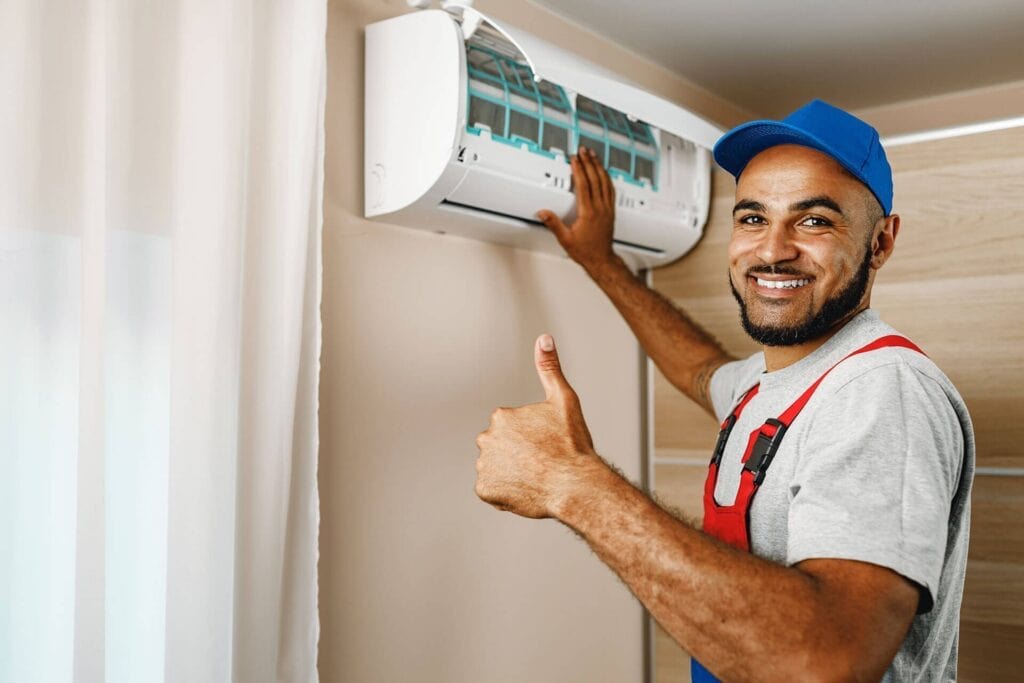 technician installing split ac